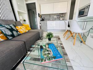 Appartements Studio vue mer dans villa moderne : photos des chambres