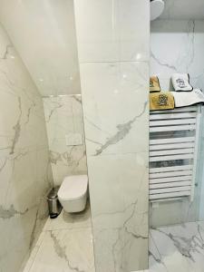 Appartements Studio vue mer dans villa moderne : photos des chambres