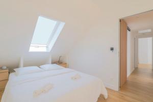 Maisons de vacances L-Orangerie, Maison moderne avec jardin : photos des chambres