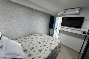 Flat praia a beira-mar