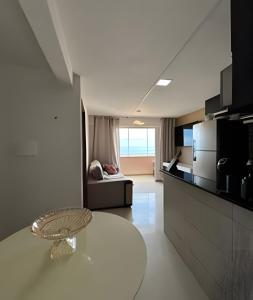 Flat praia a beira-mar