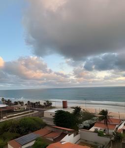Flat praia a beira-mar