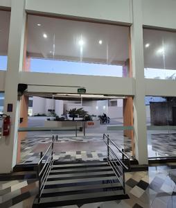 Flat pé na areia à beira-mar