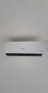 Flat pé na areia à beira-mar