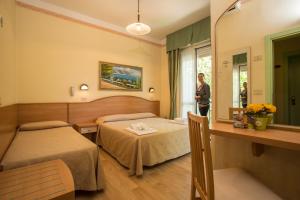 Triple Room with Balcony room in Albergo Ristorante Pozzi