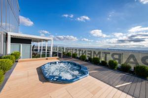 Elevated Escape - 2BR w Gym & Rooftop Spa