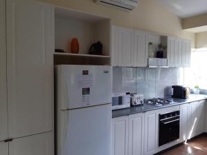 Holiday house among native trees overlooking wetlands