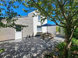 Maisons de vacances Holiday Home in Cleder near Amiets Beach : photos des chambres