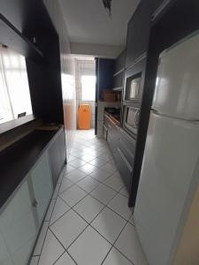 Apartamento Praia dos Ingleses 2 Quartos, Ar, Wi-Fi e Estacionamento