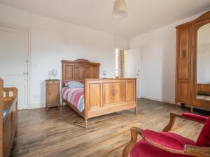 Maisons de vacances Vintage Holiday Home in Nouart : photos des chambres