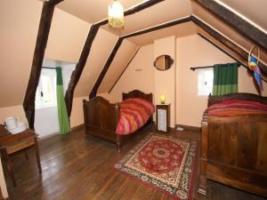 Maisons de vacances Holiday Home in Saint-Geniez-d'Olt near Lot River : photos des chambres