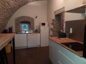 Maisons de vacances Holiday Home in Saint-Geniez-d'Olt near Lot River : photos des chambres