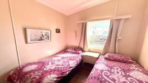 Twin Dolphins 2, 2 - 18 Clarence St