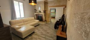 Maisons de vacances Spacieuse maison en pierre : photos des chambres