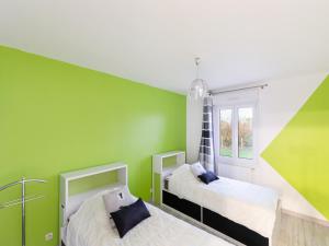 Maisons de vacances Tranquil Garden Retreat by the Sea : photos des chambres