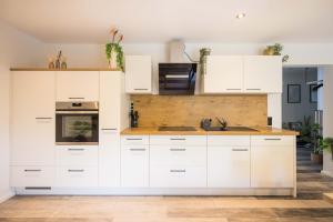 Tropengeflüster Penthouse in Hof, Whirlpool, Balkon, Webergrill, Digital Checkin, Parkplatz, Wlan330Mbit