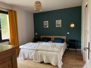Maisons de vacances Maison neuve de plain pied au coeur d-un jardin arbore : photos des chambres