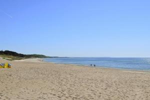 Apartment in Rowy with a garden