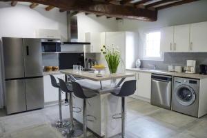 Maisons de vacances Semi-detached house, Rieux : photos des chambres