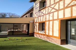 Maisons de vacances Semi-detached house, Rieux : photos des chambres