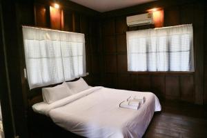 Thai wooden house near the pond Mountain View Chiang mai