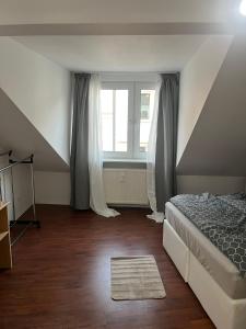 Vis-à-Vis Komfort DG-Wohnung