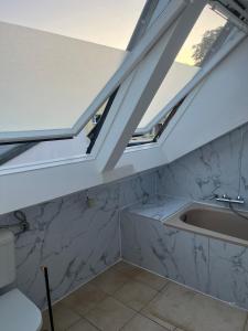 Vis-à-Vis Komfort DG-Wohnung