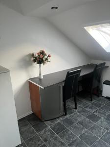 Vis-à-Vis Komfort DG-Wohnung