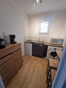 Appartements  L-Echappee Bleue  Studio tout equipe proche Rance : photos des chambres
