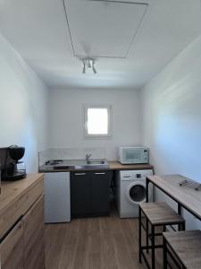 Appartements  L-Echappee Bleue  Studio tout equipe proche Rance : photos des chambres