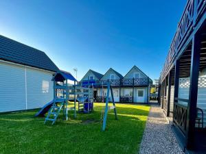 Comfortable holiday houses near the sea, Rewal