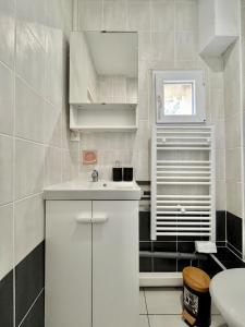 Appartements T4 minimaliste a 15 min de Lyon : photos des chambres