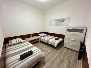 Appartements T4 minimaliste a 15 min de Lyon : photos des chambres