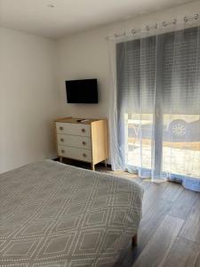 Appartements Rez de villa Grand T2 : photos des chambres
