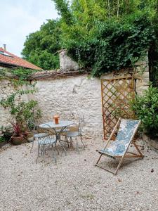 Appartements Petite maison cosy a Moret-sur-Loing, terasse privee : photos des chambres