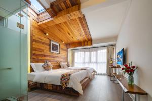 Zhangjiajie Maosao Inn - 3hvězdičkové hotely ve městě Čang-ťia-ťie