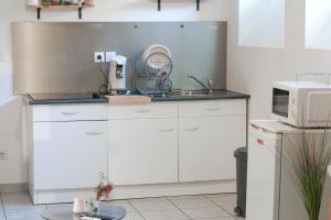 Appartements Cosy Cocon - Parking et Wifi Gratuit - Proche Luxembourg - ideal Professionnel ou Couple - OFFRE SPECIALE : photos des chambres