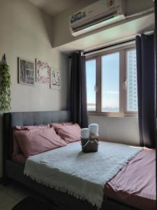 CozyStay by MA Condotel-Coast Residences