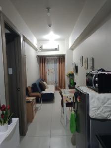 CozyStay by MA Condotel-Coast Residences