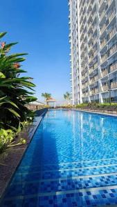 CozyStay by MA Condotel-Coast Residences