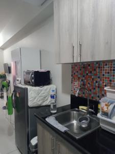 CozyStay by MA Condotel-Coast Residences