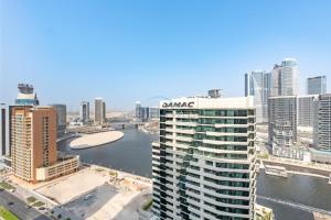 City View with Balcony Next to Dubai Water Canal, Walking Distance to Marine Transport Station, Easy Downtown Access, Reva Residences, Business Bay by Deluxe Holiday Homes