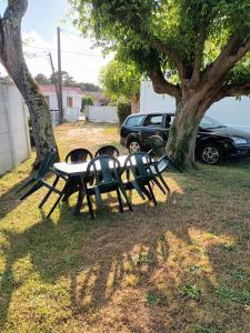 Maisons de vacances Maison individuelle avec jardin : photos des chambres