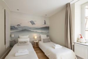 Appartements Les Gites Du Retable : photos des chambres