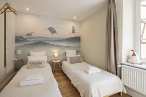 Appartements Les Gites Du Retable : photos des chambres