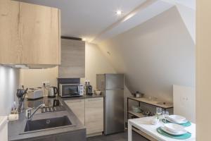 Appartements Les Gites Du Retable : photos des chambres