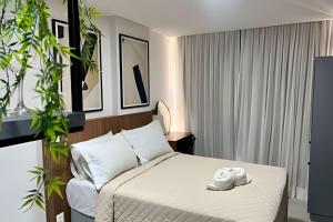 Flat pé na areia Breeze