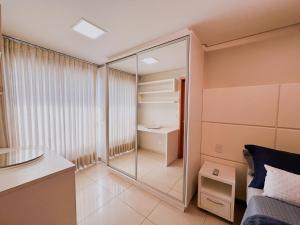 Flat em frente Flamboyant Shopping