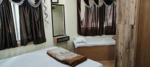 M hotel kidwai tower Near Esplanade New Market