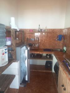 Blue House, Strand Amed